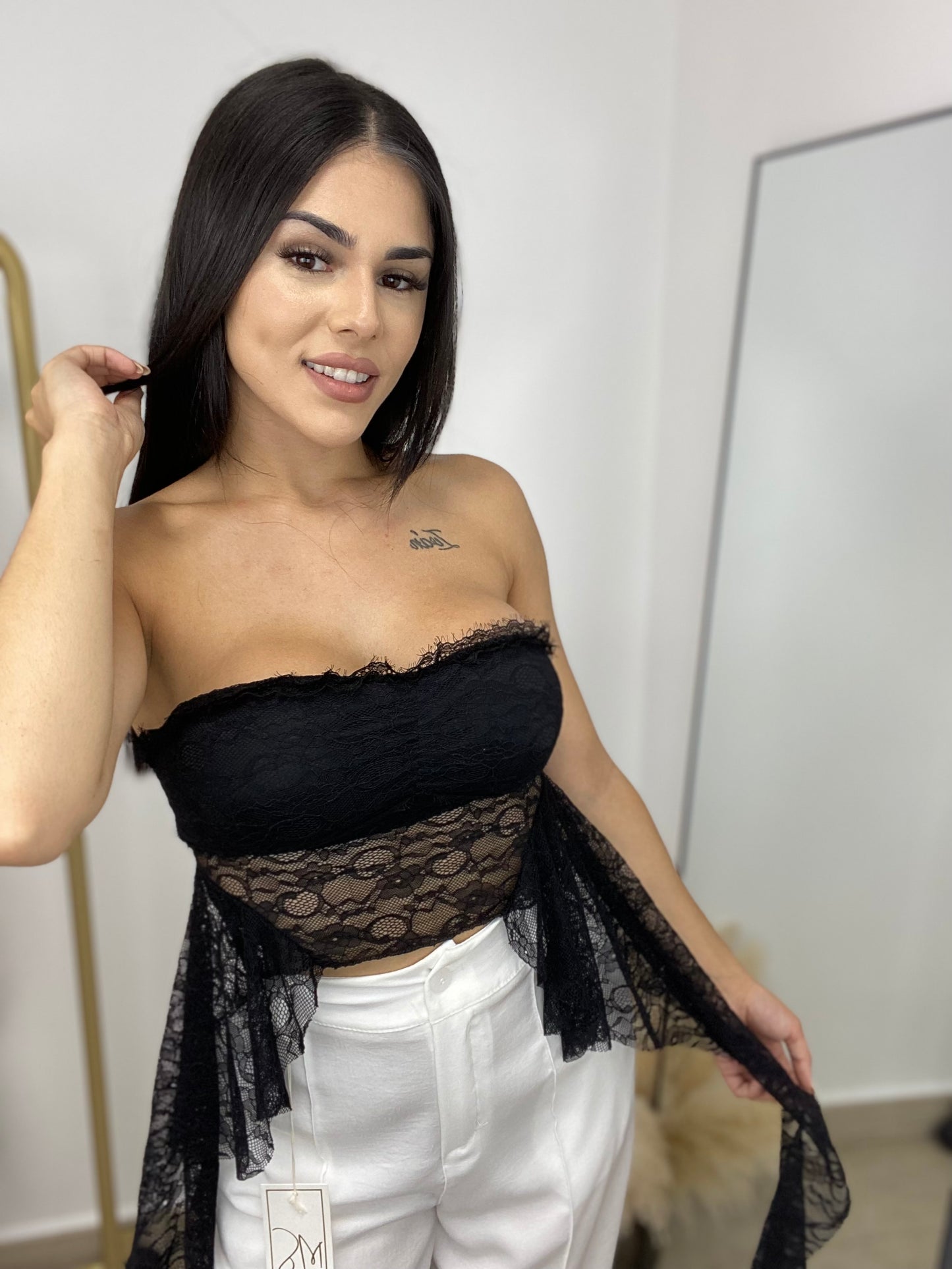 Top encaje volantes negro