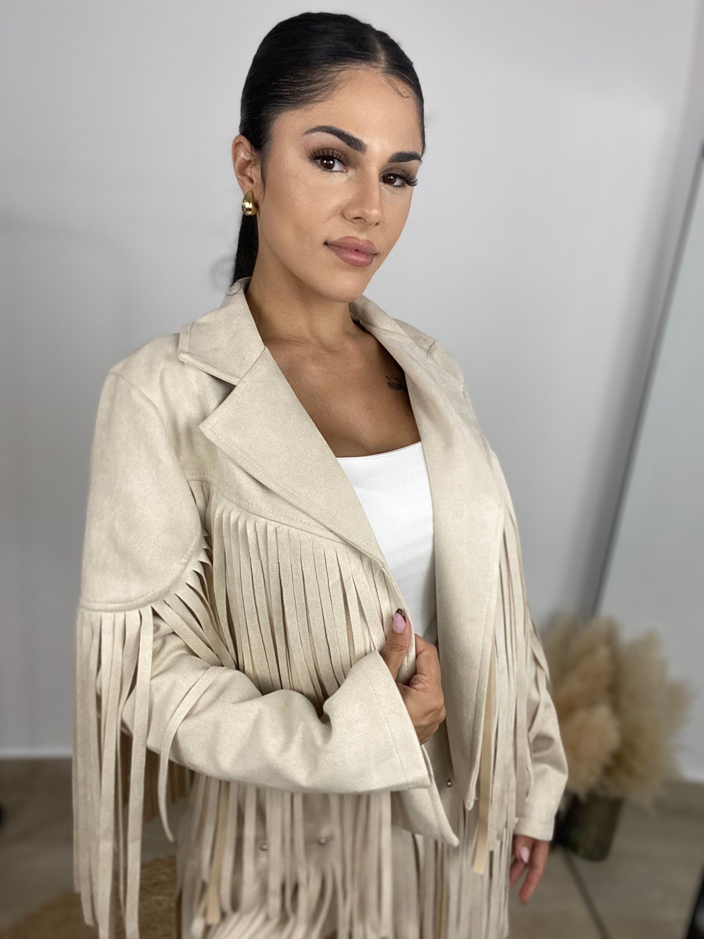 Chaqueta flecos beige